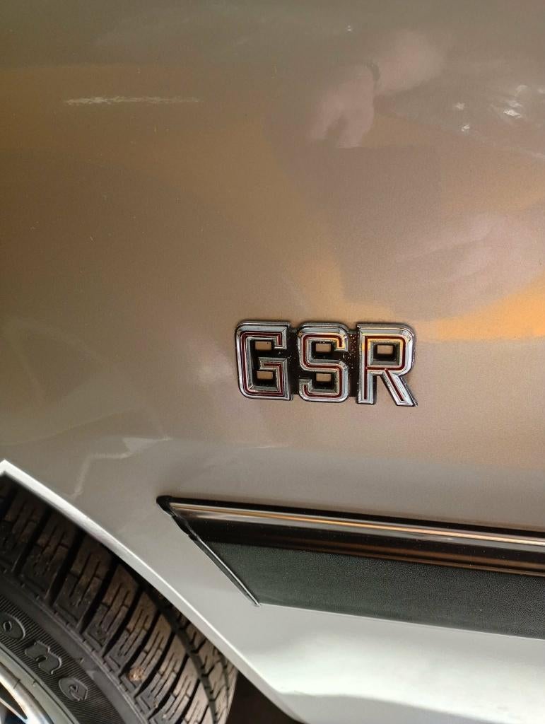 GEZOCHT Mitsubishi GSR embleem, Auto-onderdelen, Carrosserie en Plaatwerk, Spatbord, Mitsubishi, Gebruikt, Ophalen of Verzenden