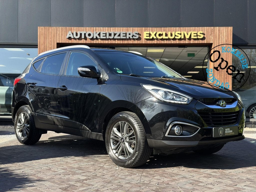 Hyundai ix35 2.0i i-Motion Cruise Clima Stoelverwarming Auto, Euro 5, Gebruikt, 4 cilinders, Leder en Stof