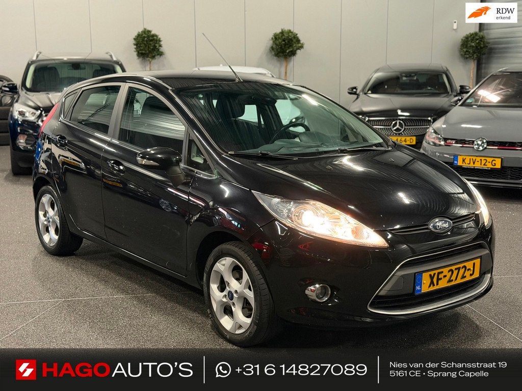 Ford Fiesta 1.25 Titanium XENON/AIRCO/CLIMATE/MULTIMEDIA/5-D, Voorwielaandrijving, Euro 5, Stof, 1242 cc