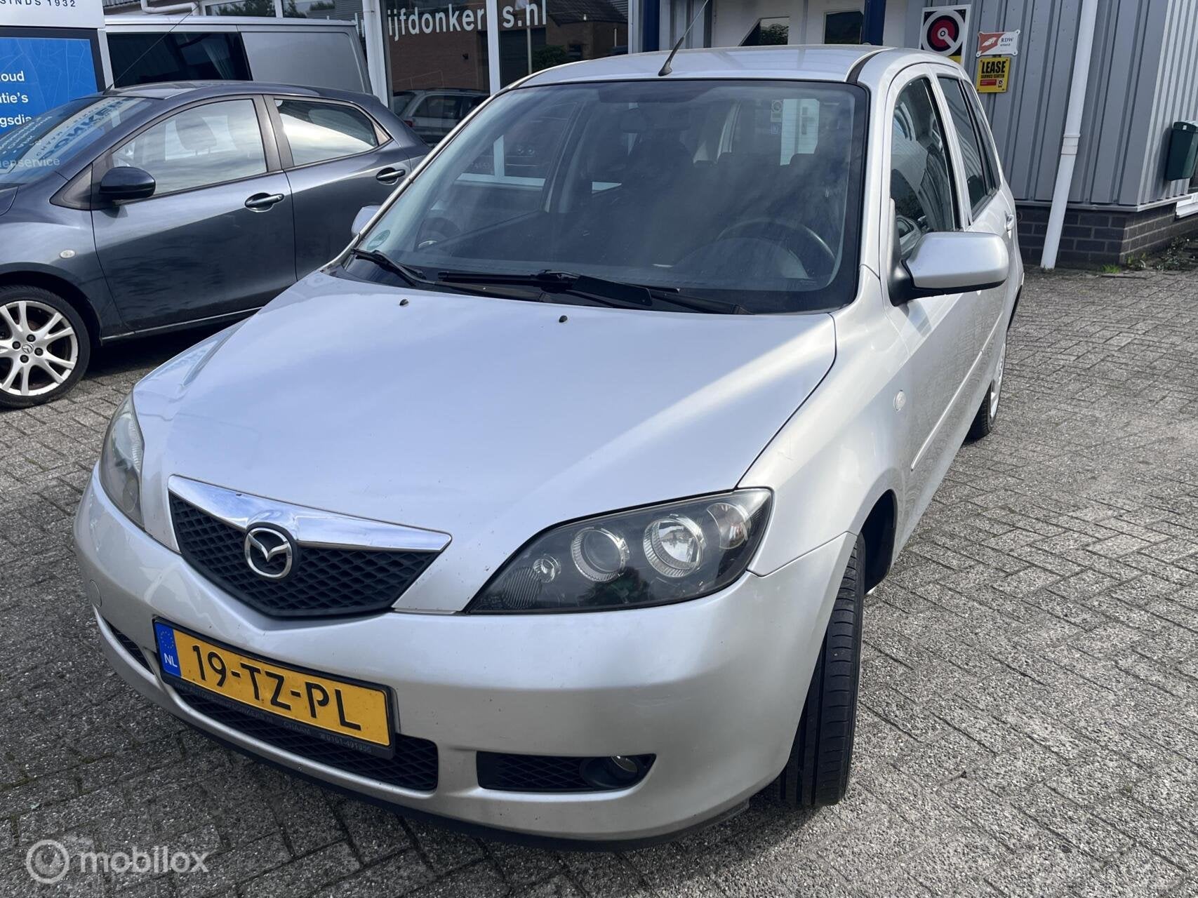 Mazda 2 1.4 Touring met nieuwe APK, Auto's, Voorwielaandrijving, 1025 kg, 15 km/l, Gebruikt
