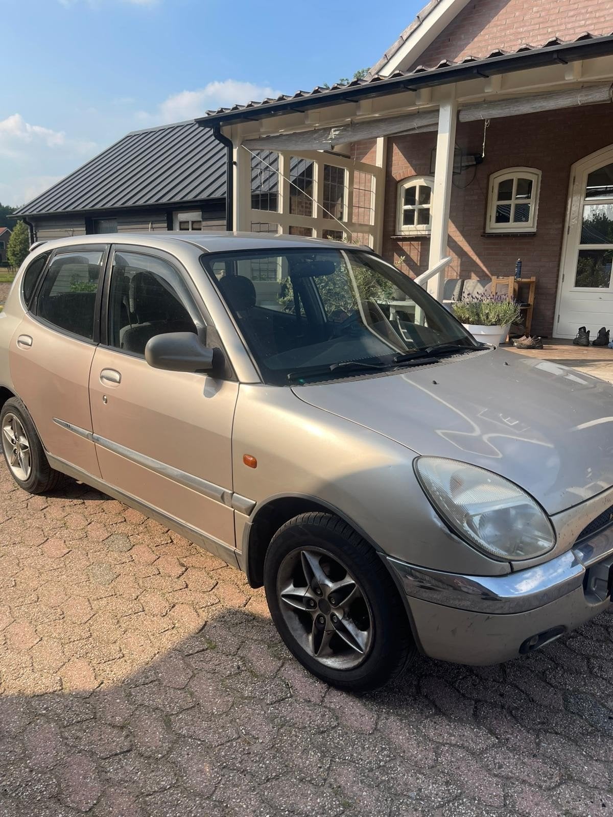 Daihatsu Sirion 1.0 1999 Grijs, Auto's, Daihatsu, Voorwielaandrijving, Stof, 750 kg, 4 cilinders