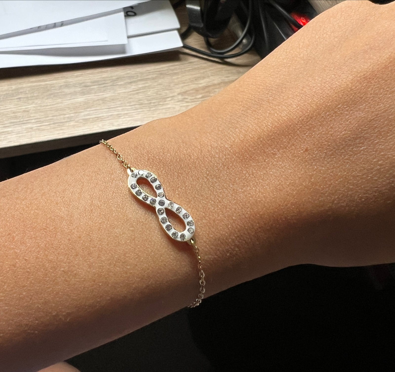 Verguld RVS Armbandje met Infinity Symbool en Strass, Staal, Nieuw, Ophalen of Verzenden, Goud
