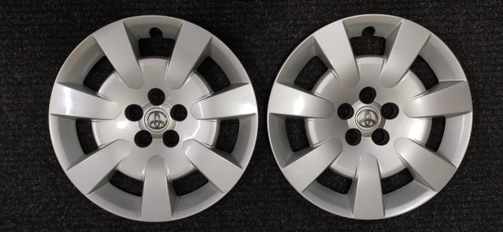 2 originele Toyota wieldoppen 16 inch - Gebruikt, Auto diversen, Wieldoppen, Ophalen of Verzenden, Gebruikt