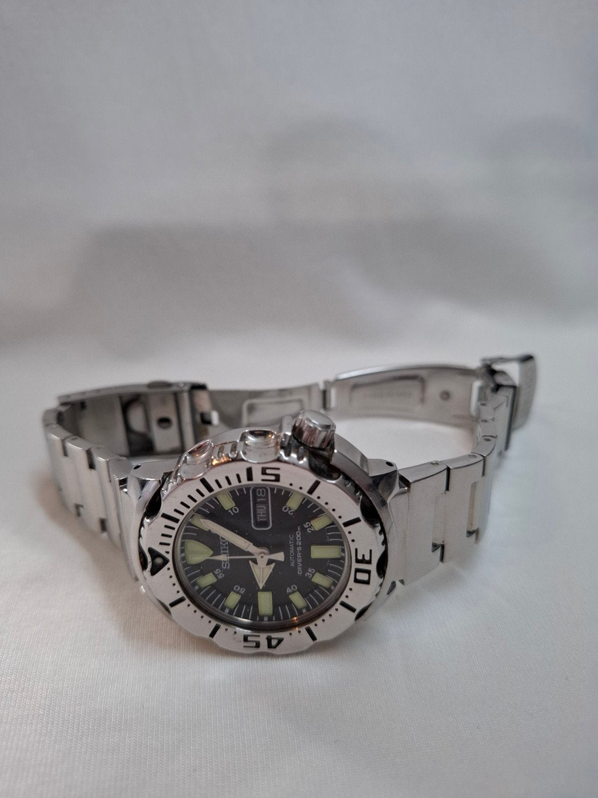Seiko Black Monster 1e Gen (SKX779/7S26-0350) met extra's, Ophalen, Gebruikt, Staal, Polshorloge