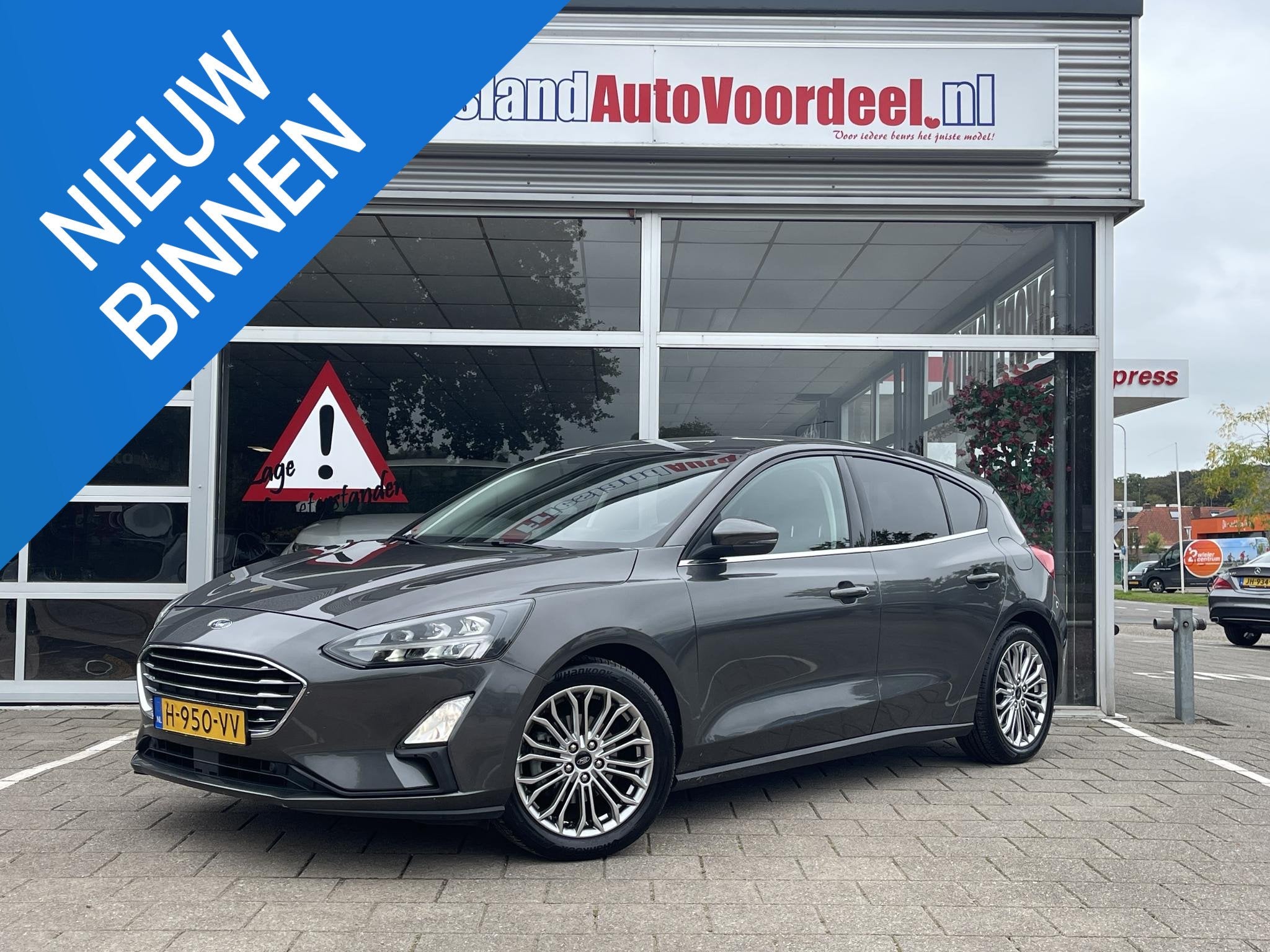 Ford Focus 1.0 EcoBoost Titanium Business /Cruise/Clima/Trek, Gebruikt, Euro 6, Met garantie (alle), Origineel Nederlands