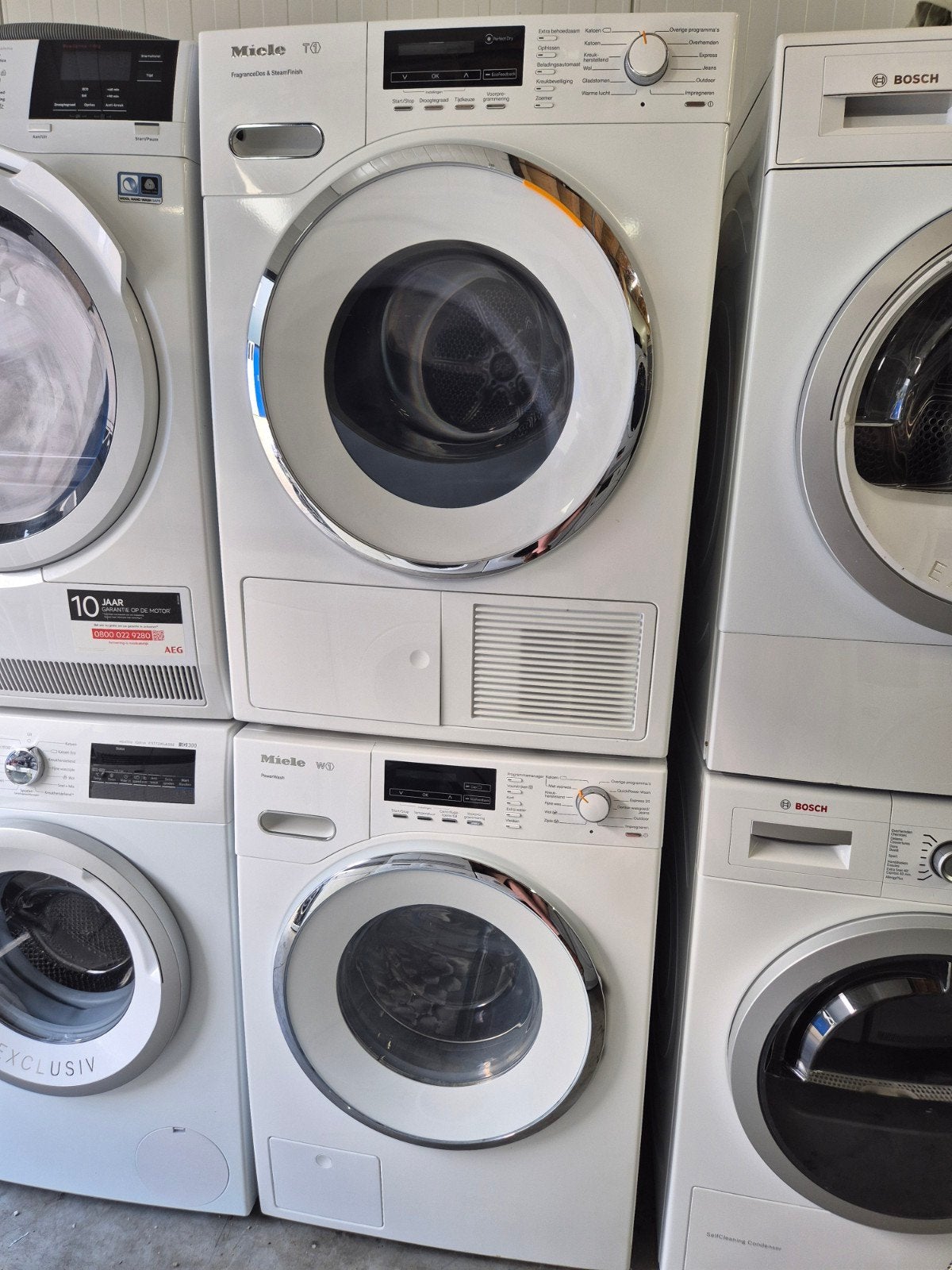 Miele wasmachine en droger set 8kg, 1600 toeren, 8 tot 10 kg, Ophalen, Gebruikt, Minder dan 85 cm