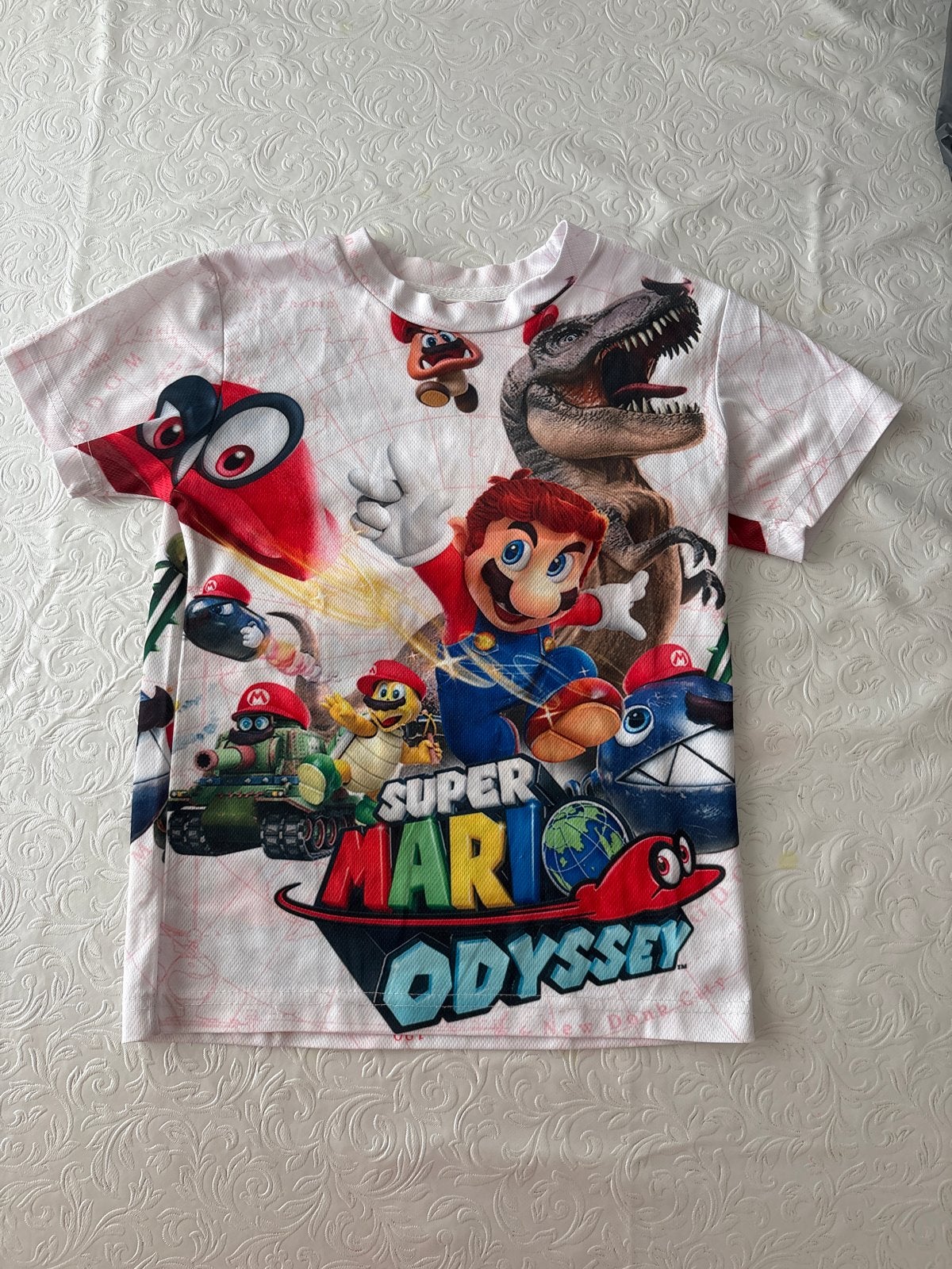Super Mario Odyssey T-shirt - Zo goed als nieuw mt 130, Ophalen of Verzenden, Zo goed als nieuw, Jongen of Meisje