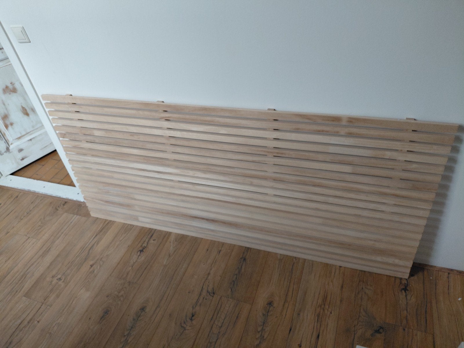 Houten wandpaneel, Ophalen