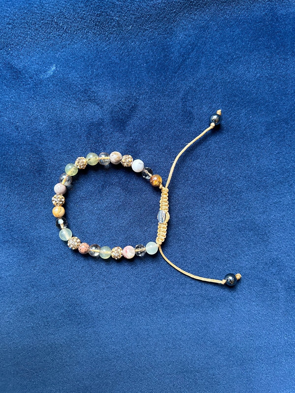 Karma armband, Sieraden, Tassen en Uiterlijk, Overige materialen, Ophalen of Verzenden, Zo goed als nieuw, Goud