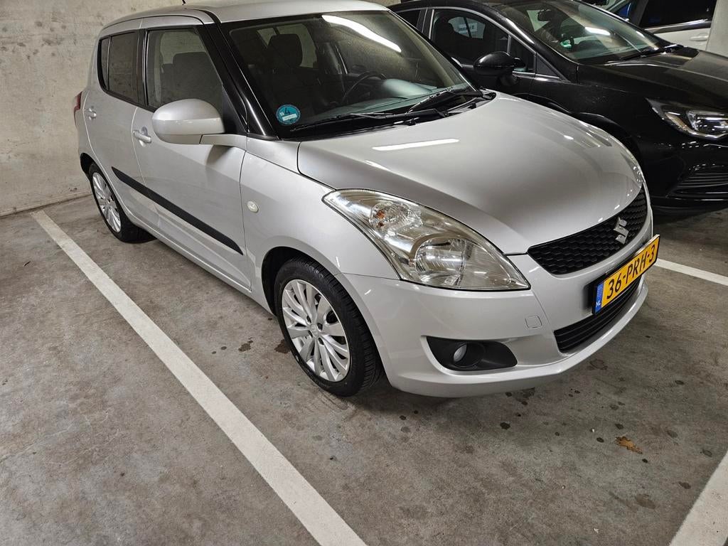 Suzuki Swift 1.2 Exclusive| APK 2027| Cruise| NAP| Trekhaak, Voorwielaandrijving, Euro 5, Stof, 4 cilinders
