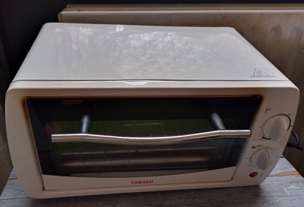 Tomado oven mini-oven campingoven TM-2405, Witgoed en Apparatuur, Ovens, Minder dan 45 cm, Gebruikt, Minder dan 45 cm, Ophalen of Verzenden