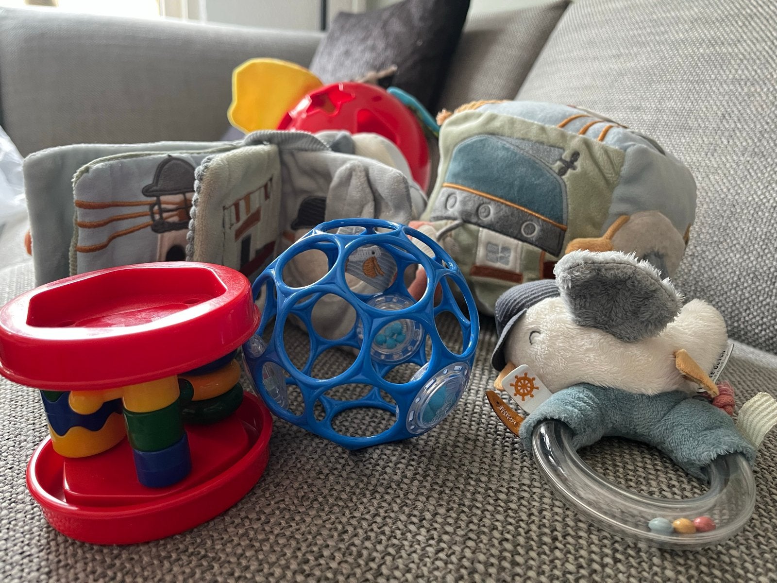 Diverse baby speeltjes: rammelaars, ballen, boekjes, Ophalen of Verzenden, Gebruikt, Overige typen