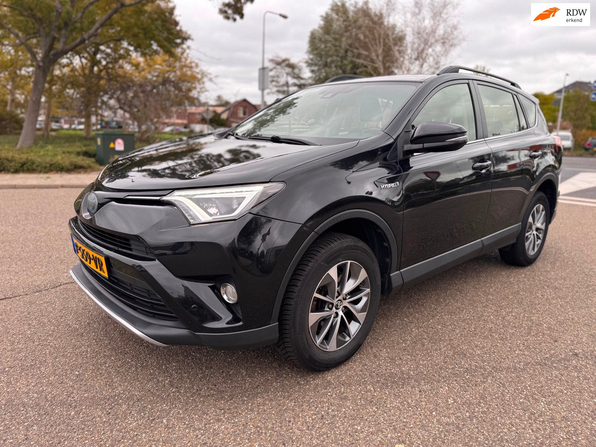 Toyota RAV4 2.5 Hybrid First Edition / automaat / airco / cr, Gebruikt, Zwart, Leder, Bedrijf