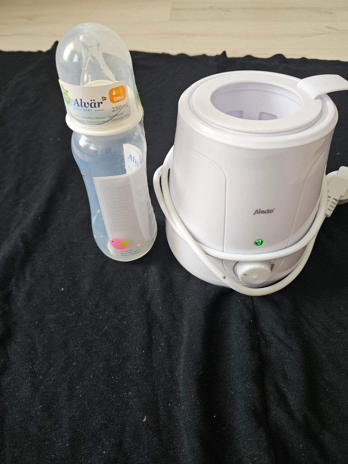 Alecto flessenwarmer met flesje, Ophalen of Verzenden, Gebruikt, Flessen- of potjesverwarmer