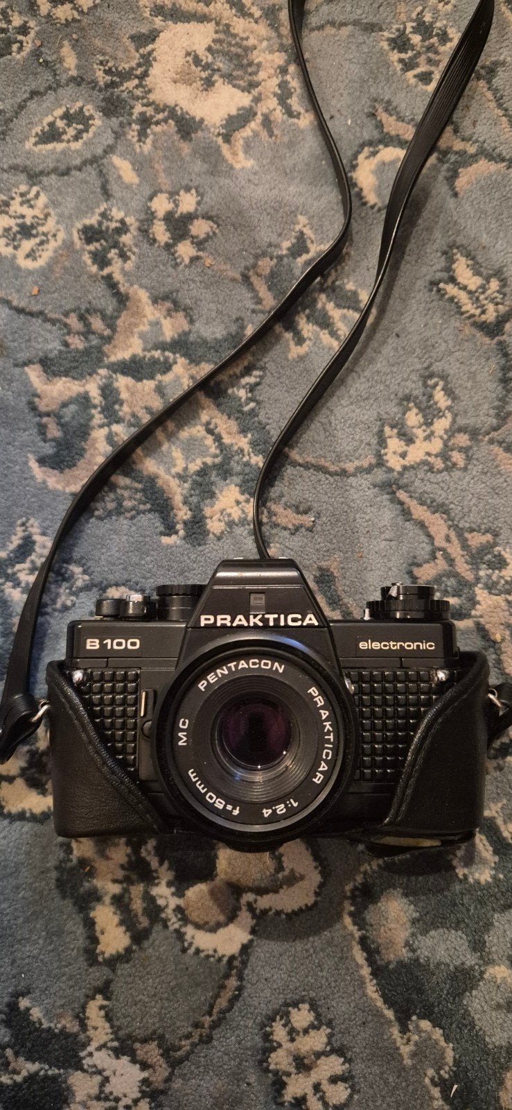 Praktica B100 spiegelreflexcamera met Pentacon lens en hoes, Ophalen of Verzenden, Gebruikt, Spiegelreflex, Overige Merken