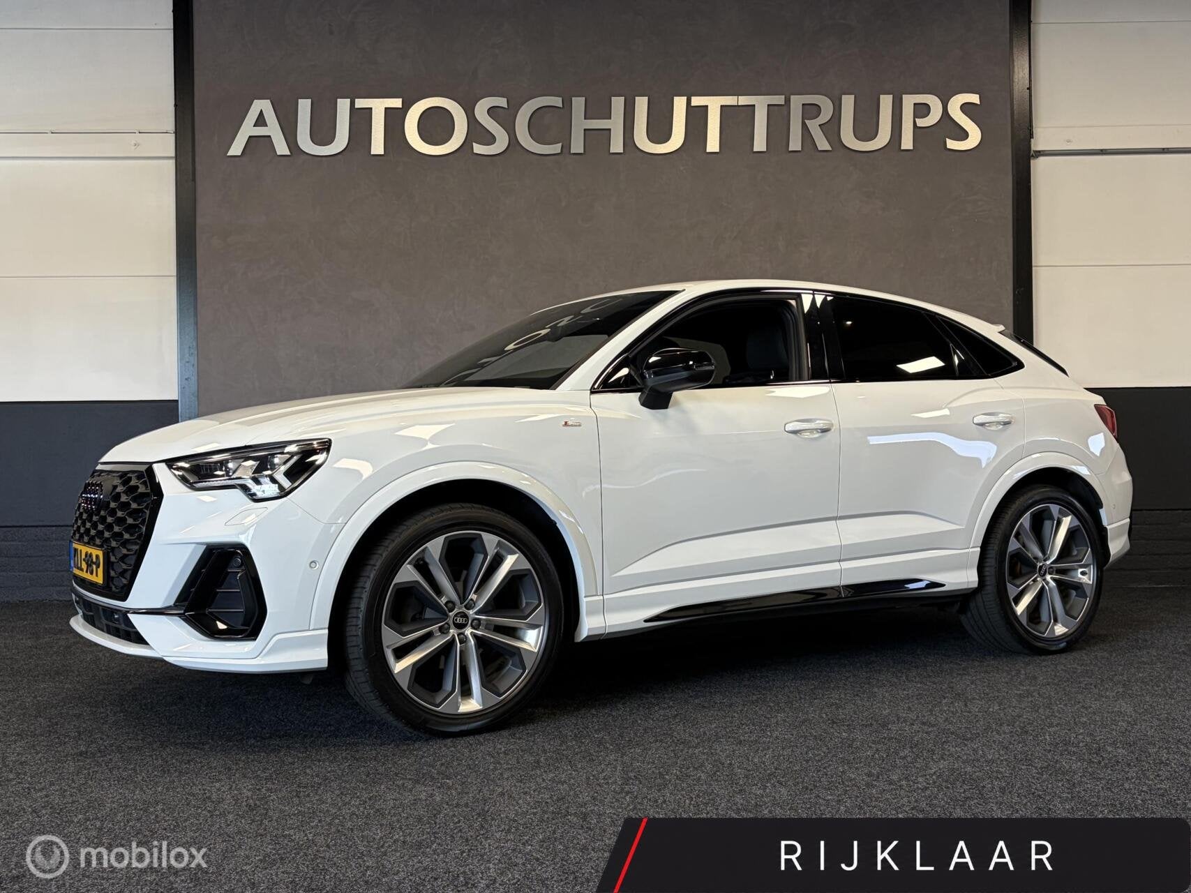 Audi Q3 Sportback 35 TFSI S Line / BLACK OPTIC / LEER / LMV, Dealer onderhouden, 15 km/l, Zwart, 4 cilinders