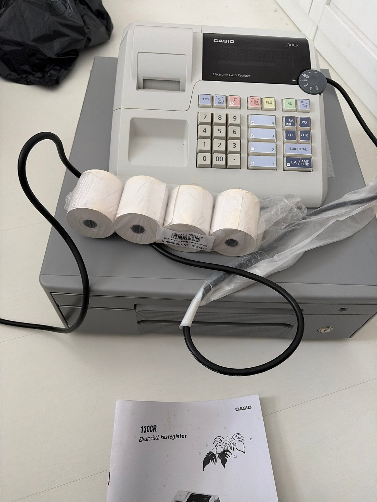 Casio 130CR Elektronisch Kasregister met handleiding, Ophalen