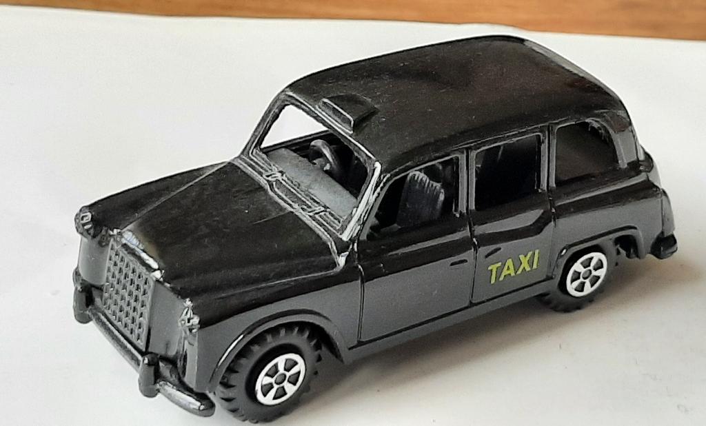 zwarte London taxi Austin? schaal 1/50, Ophalen of Verzenden, Zo goed als nieuw, Auto, Overige merken