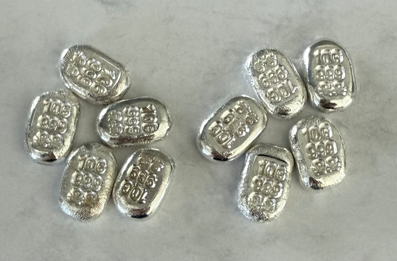 10x 10 gram zilverbaartjes skulls / 999 zilver, Ophalen of Verzenden
