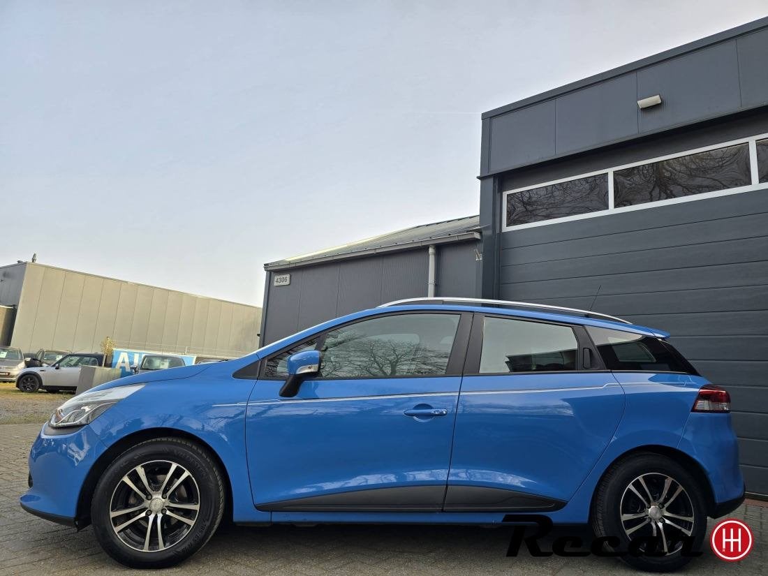 Renault Clio Estate - 1.2-16V Collection/84Dk/Pdc/Cruise/Tre, Auto's, Voorwielaandrijving, Gebruikt, Automatische klimaatregeling