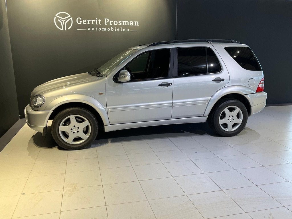 Mercedes-Benz M-klasse 55 AMG (Let op! BTW verrekenbaar), Auto's, Mercedes-Benz, Automaat, Gebruikt, 347 pk, Leder