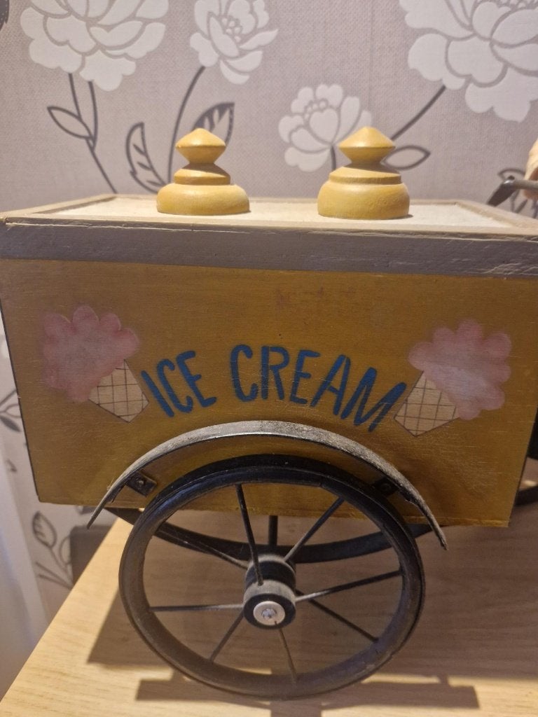 Decoratieve ijscowagen met beeld, Ophalen