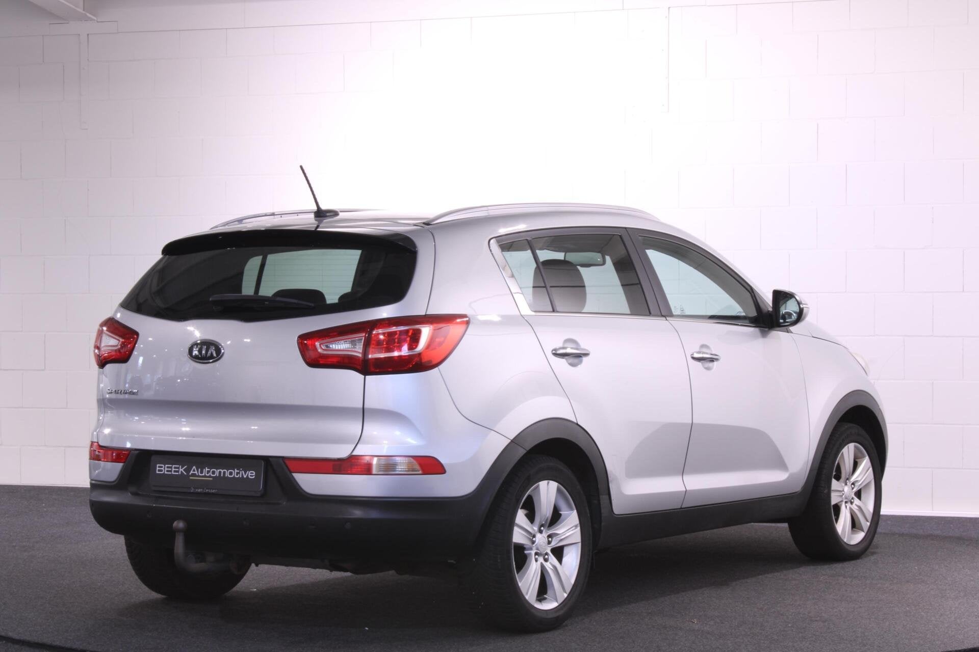 Kia Sportage 2.0 X-ecutive | Panoramadak | Trekhaak | Camera, Auto's, Gebruikt, Zwart, 4 cilinders, Met garantie (alle)
