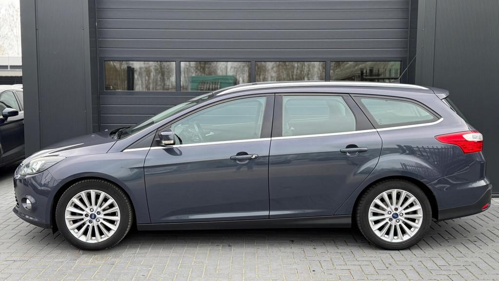 Ford Focus Wagon 1.0 EcoBoost Titanium Airco|Navi|Trekhaak, Auto's, Euro 5, 125 pk, Gebruikt, Leder en Stof