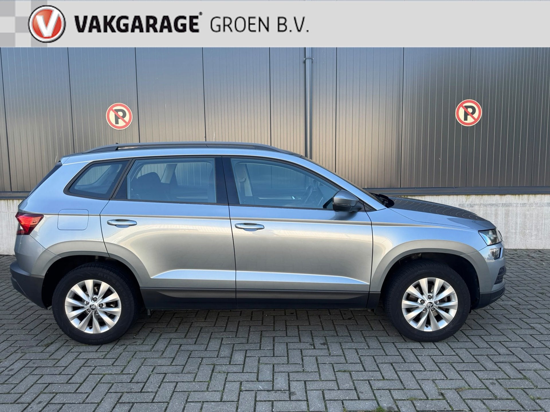 Skoda Karoq 1.0 TSI Style / clima / cruise / navi / camera /, Auto's, Voorwielaandrijving, Stof, Gebruikt, Verwarmde buitenspiegels