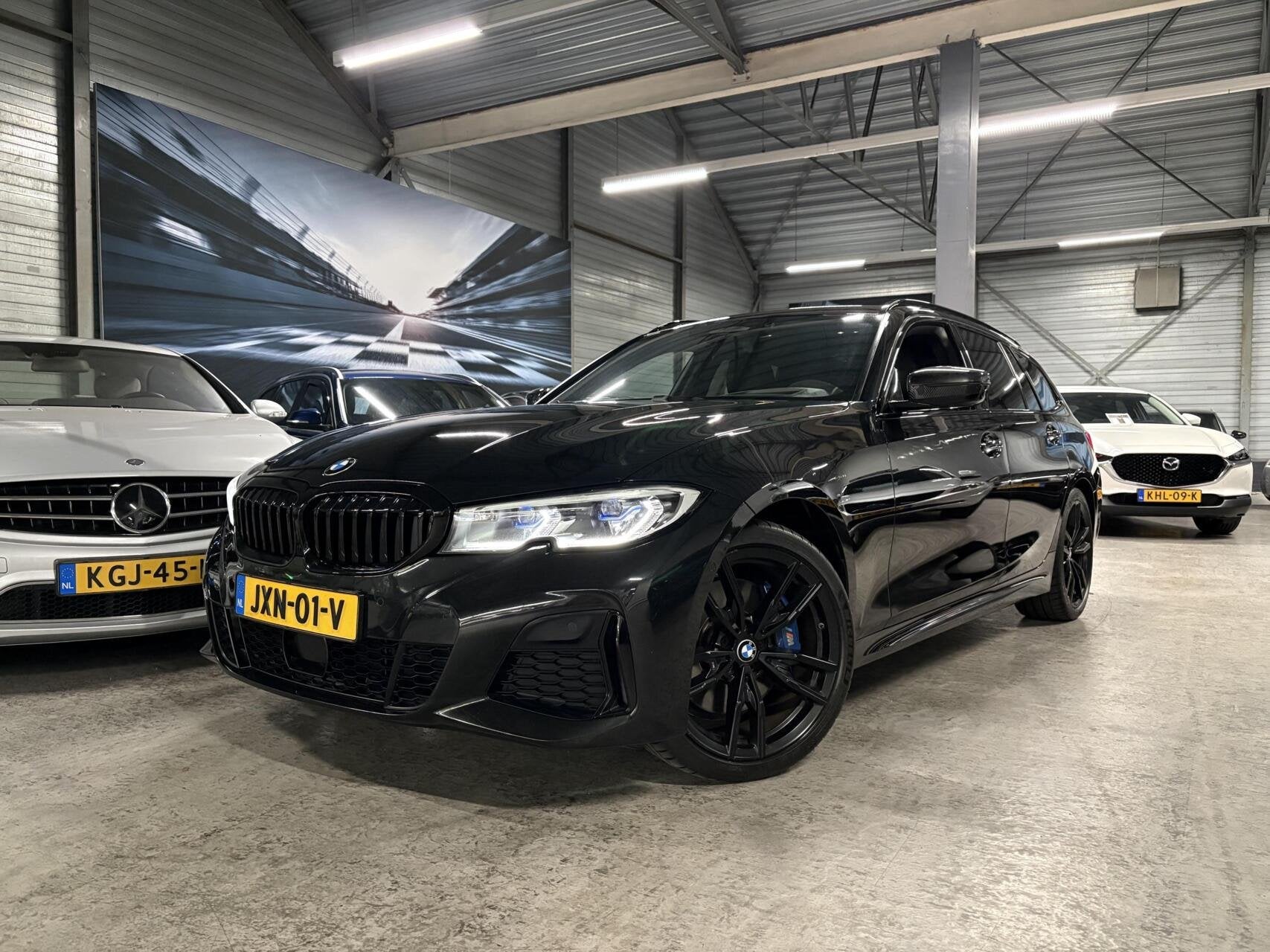 BMW 3-serie Touring M340i High Executive|Laser|HUD|M3|Trekha, Auto's, 1780 kg, Zwart, Leder, Parkeerassistent