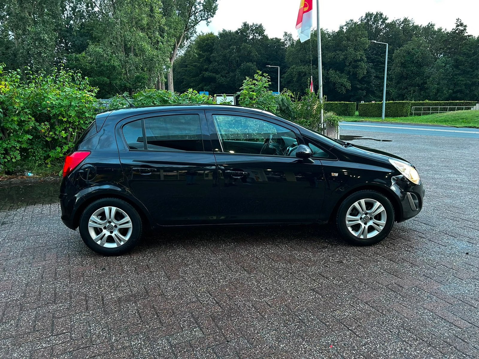 Opel Corsa 1.2 Ecoflex 5D 2011 Zwart, Auto's, Voorwielaandrijving, Euro 5, Stof, Metallic lak