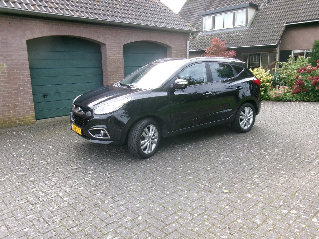 Hyundai iX35 2.0i Cvvt 163pk 2010 Zwart, Auto's, 1998 cc, Zwart, 4 cilinders, 75 €/maand