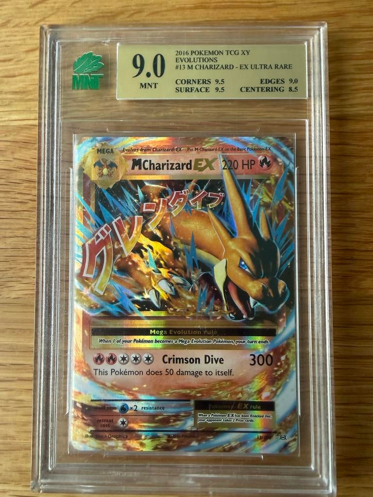 M Charizard EX Ultra Rare 2016 Pokemon Graded, Ophalen of Verzenden, Zo goed als nieuw, Losse kaart