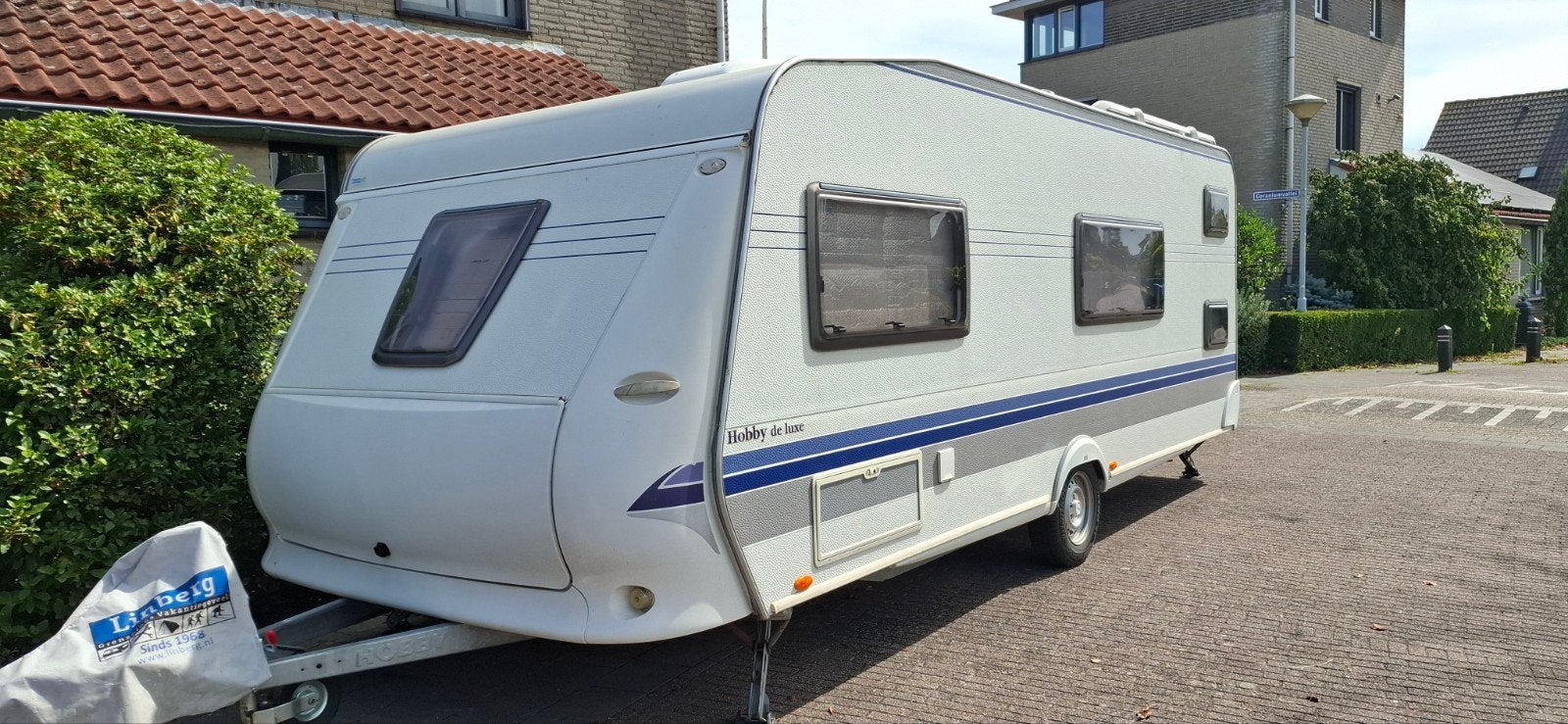 Hobby 560KMFE De Luxe uit 2008 met stapelbed, Vast bed, Rondzit, Hobby, Particulier