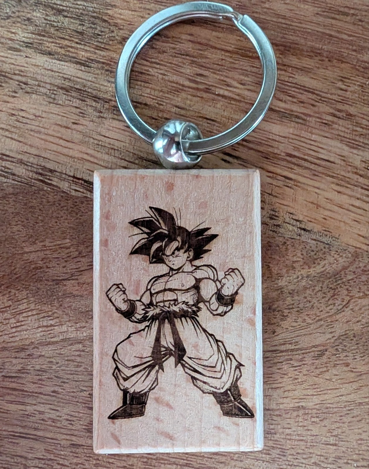 Dragon Ball Z Goku sleutelhanger hout 5x3cm, Ophalen of Verzenden, Nieuw, Knuffel of Figuurtje