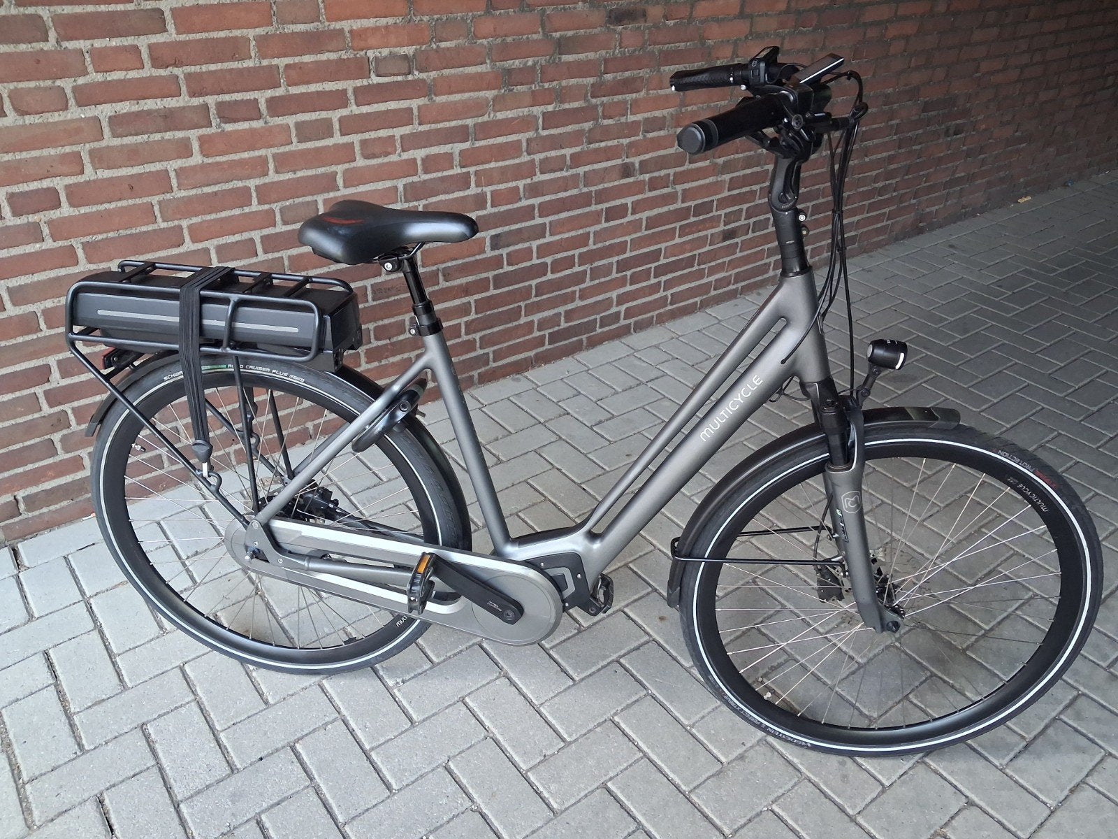 Multicycle Voyage E-bike (zo goed als nieuw) met middenmotor, 55 tot 59 cm, Ophalen, Zo goed als nieuw, 50 km per accu of meer