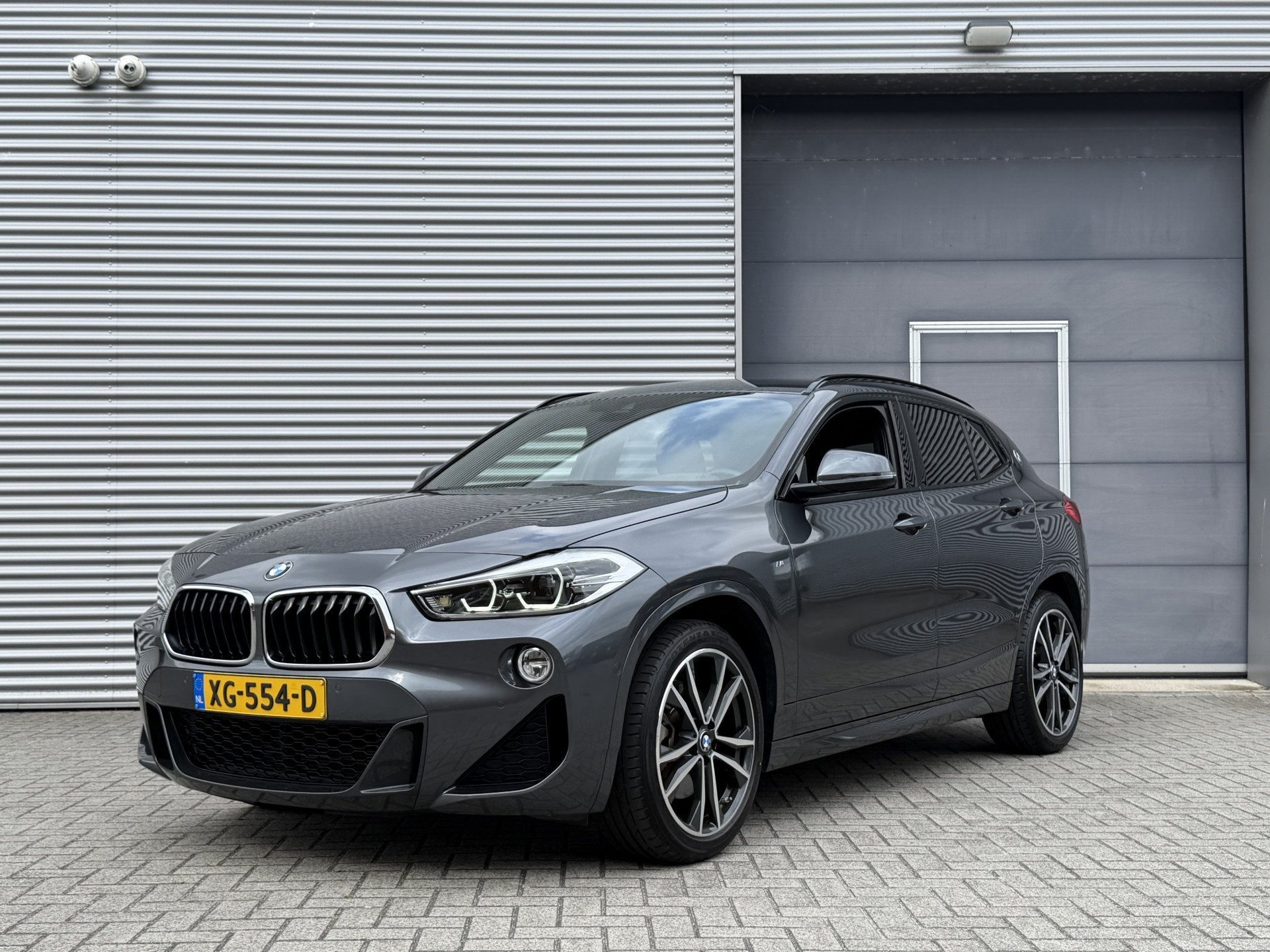 BMW X2 sDrive20i High Executive I Aut. I M-Sport I 192 PK I, Auto's, BMW, 1998 cc, X2, SUV of Terreinwagen, Zilver of Grijs