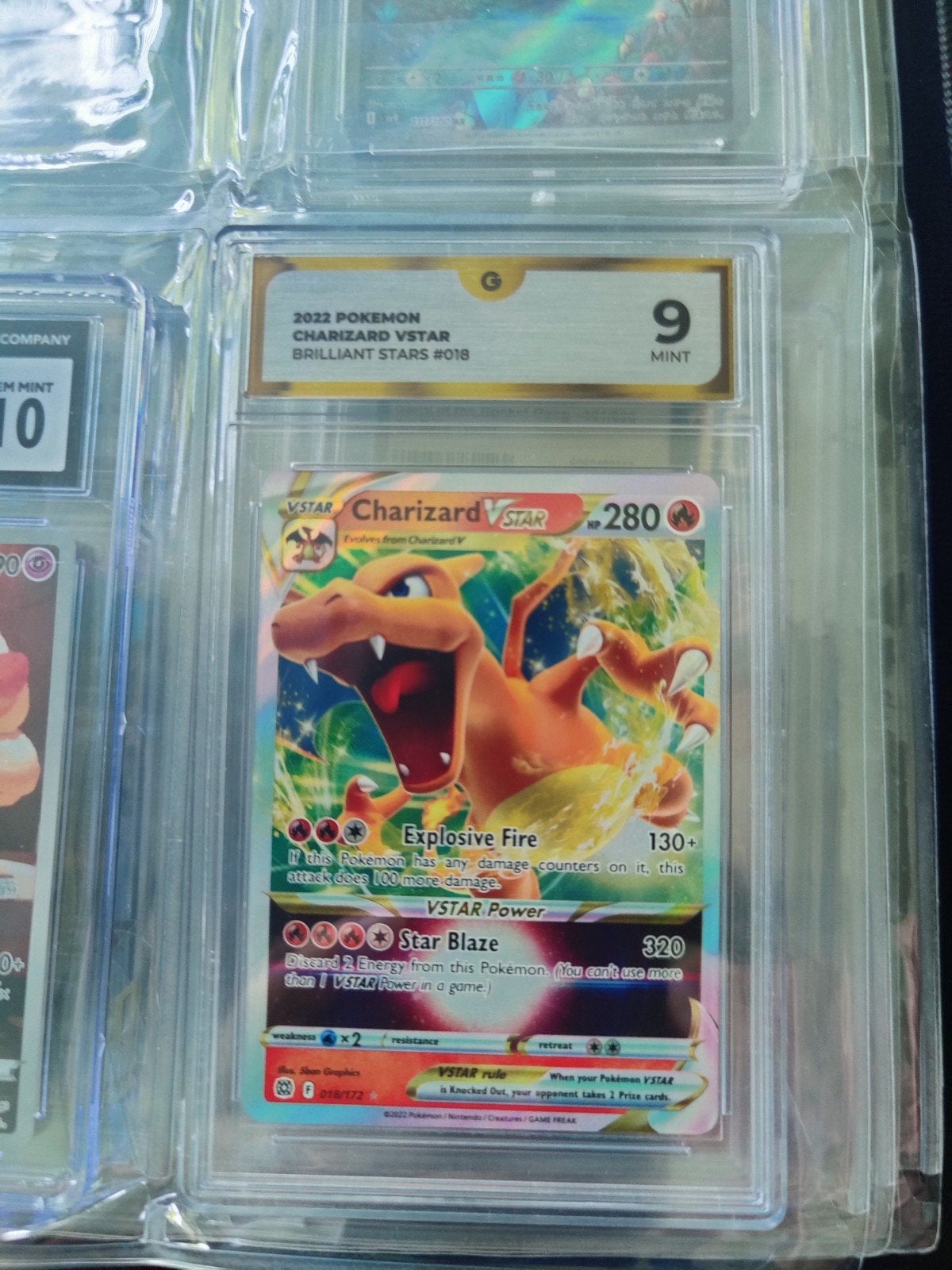 Graded pokémon kaart Charizard vstar 018/172 GG 9, Ophalen of Verzenden, Zo goed als nieuw, Losse kaart, Foil