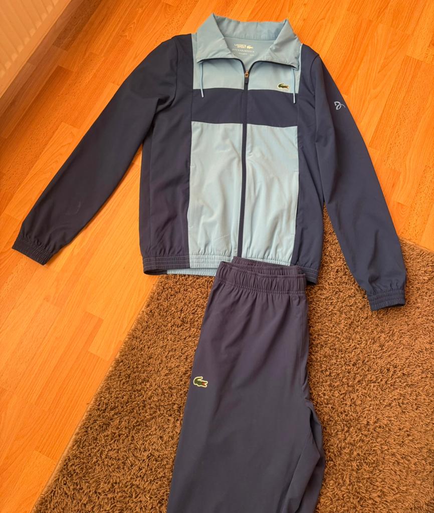 Originele lacoste heren pak blauw, Blauw, Ophalen of Verzenden, Zo goed als nieuw, Algemeen