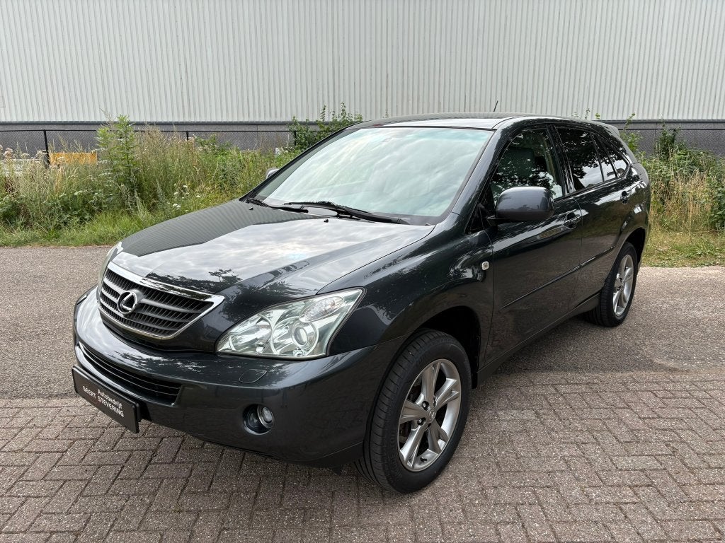 Lexus RX 400H 3.3 V6 AUT 2006 / Camera / Leder / Nette auto, Auto's, Lexus, Automaat, 3311 cc, Beige, Hybride Elektrisch/Benzine