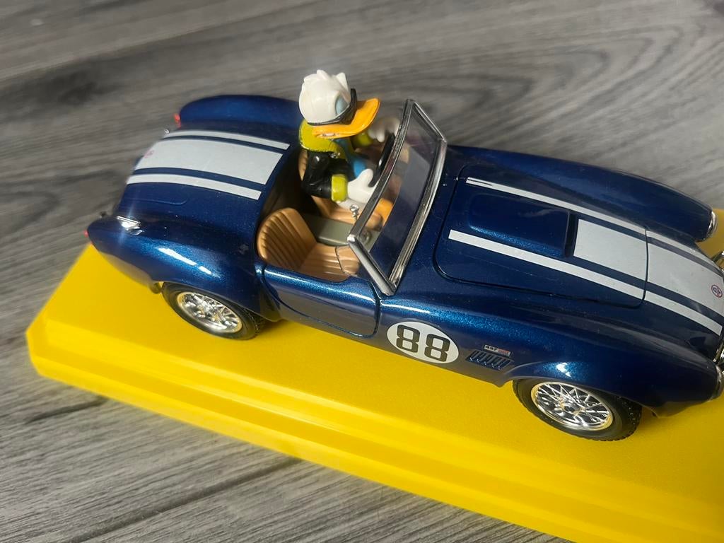 Burago auto met donald Duck, Verzenden, Zo goed als nieuw, Bburago