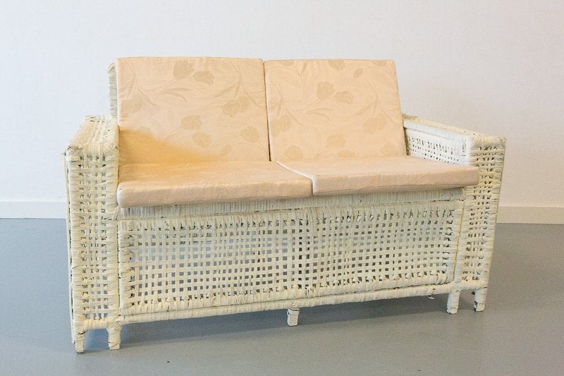 Decoratief rieten bankje in koloniale stijl, Ophalen