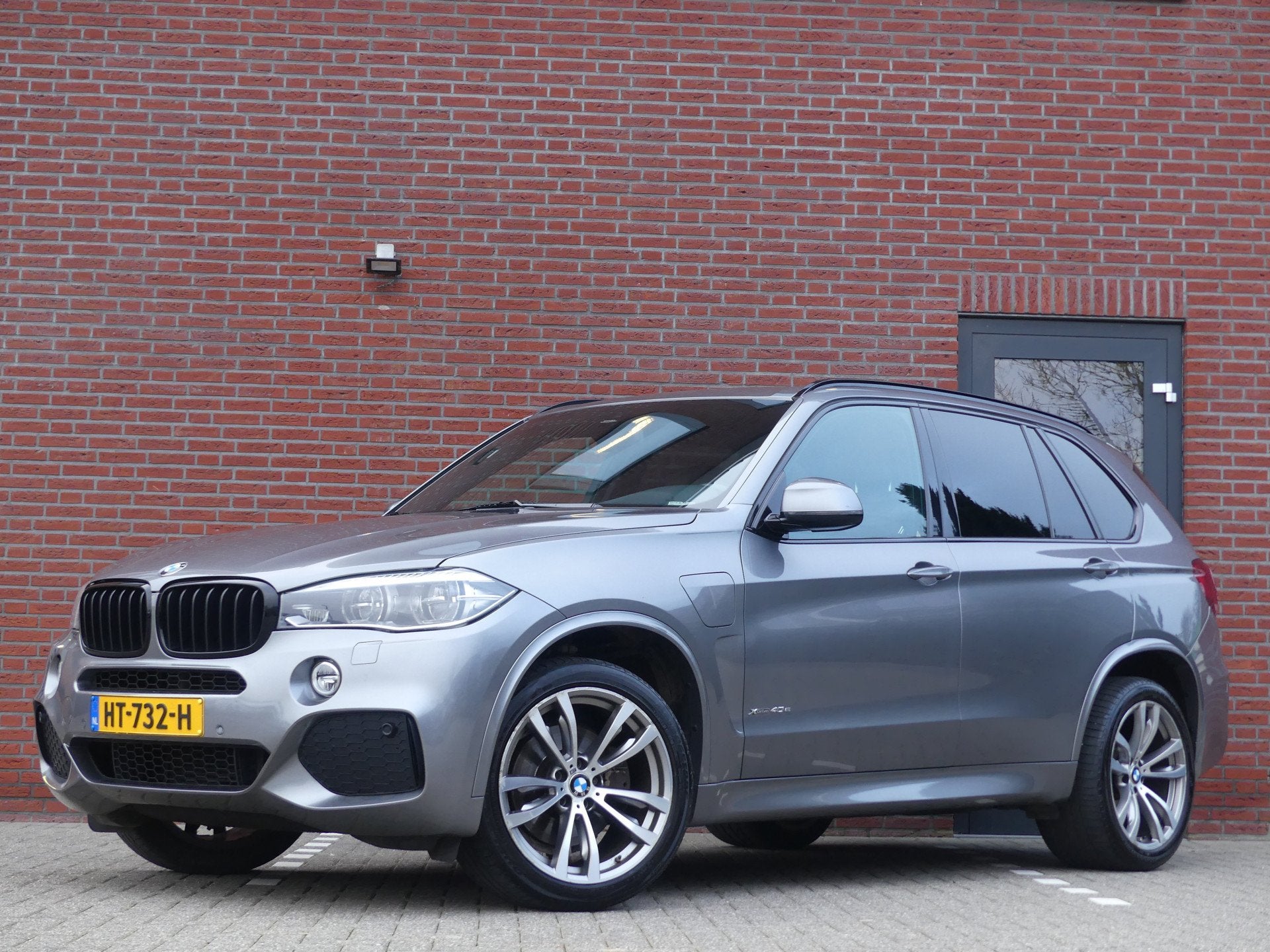 BMW X5 xDrive40e High Executive M-Sport (bj 2015, automaat), Auto's, Gebruikt, 4 cilinders, Vierwielaandrijving, 147 €/maand