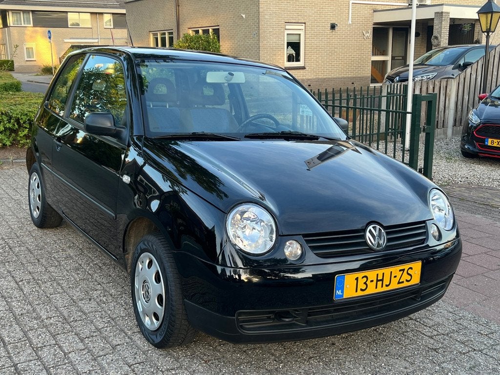 Volkswagen Lupo 1.4 Trendline 125.000 km NL-AUTO-NAP, Voorwielaandrijving, Gebruikt, 4 cilinders, Zwart