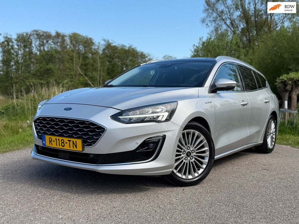 Ford Focus Wagon 1.0 EcoBoost Vignale Automaat / Panoramadak, Auto's, Ford, 125 pk, Gebruikt, Leder, 3 cilinders