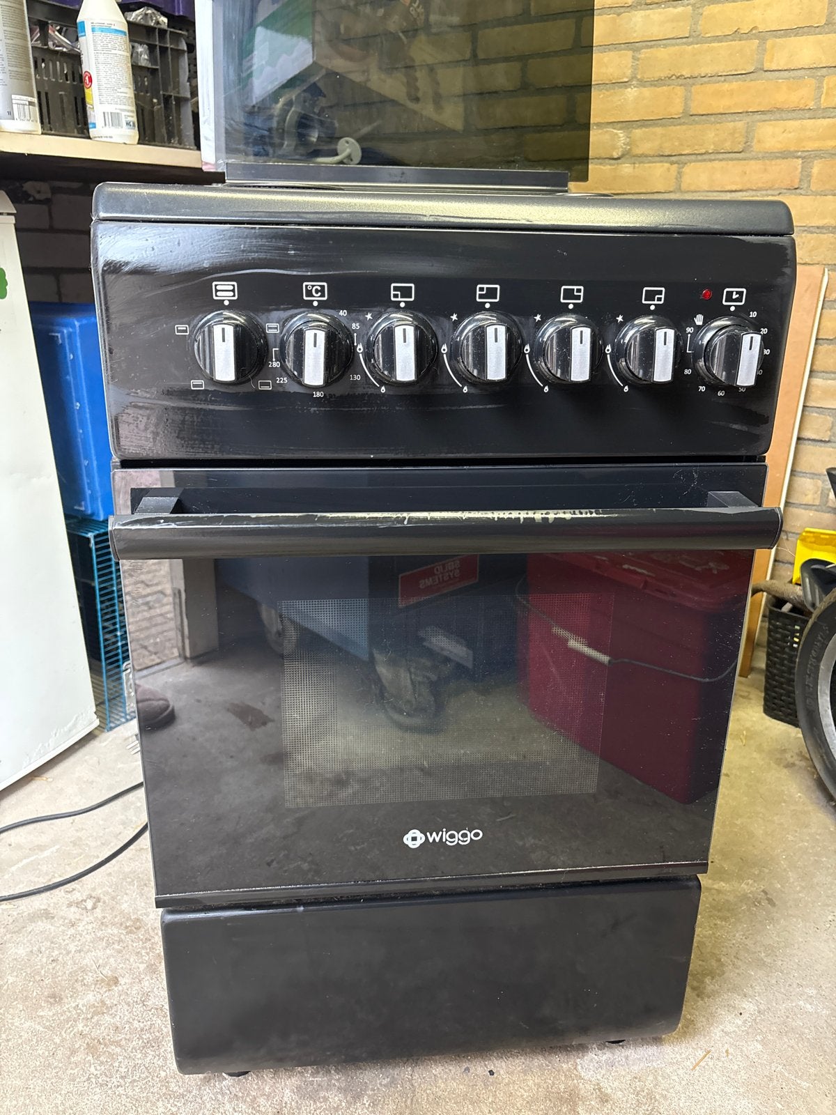 Goed werkende Wiggo gasfornuis en oven 50x55x80 cm, Witgoed en Apparatuur, Fornuizen, Ophalen, Gebruikt, 4 kookzones, Gas