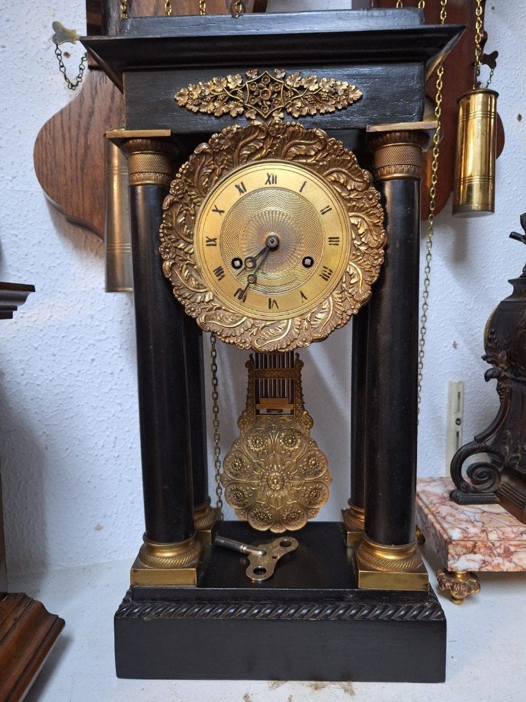 leuke kolom pendule, Ophalen