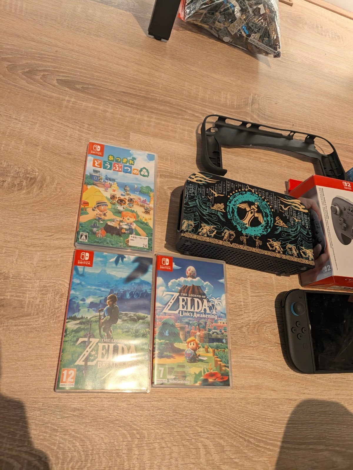 Foto 3 van Nintendo Switch 2 met accessories en games