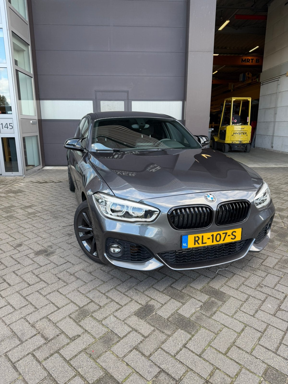 BMW 1-Serie 118i 136pk Aut 2018 Grijs, Auto's, Alcantara, Origineel Nederlands, 650 kg, Particulier