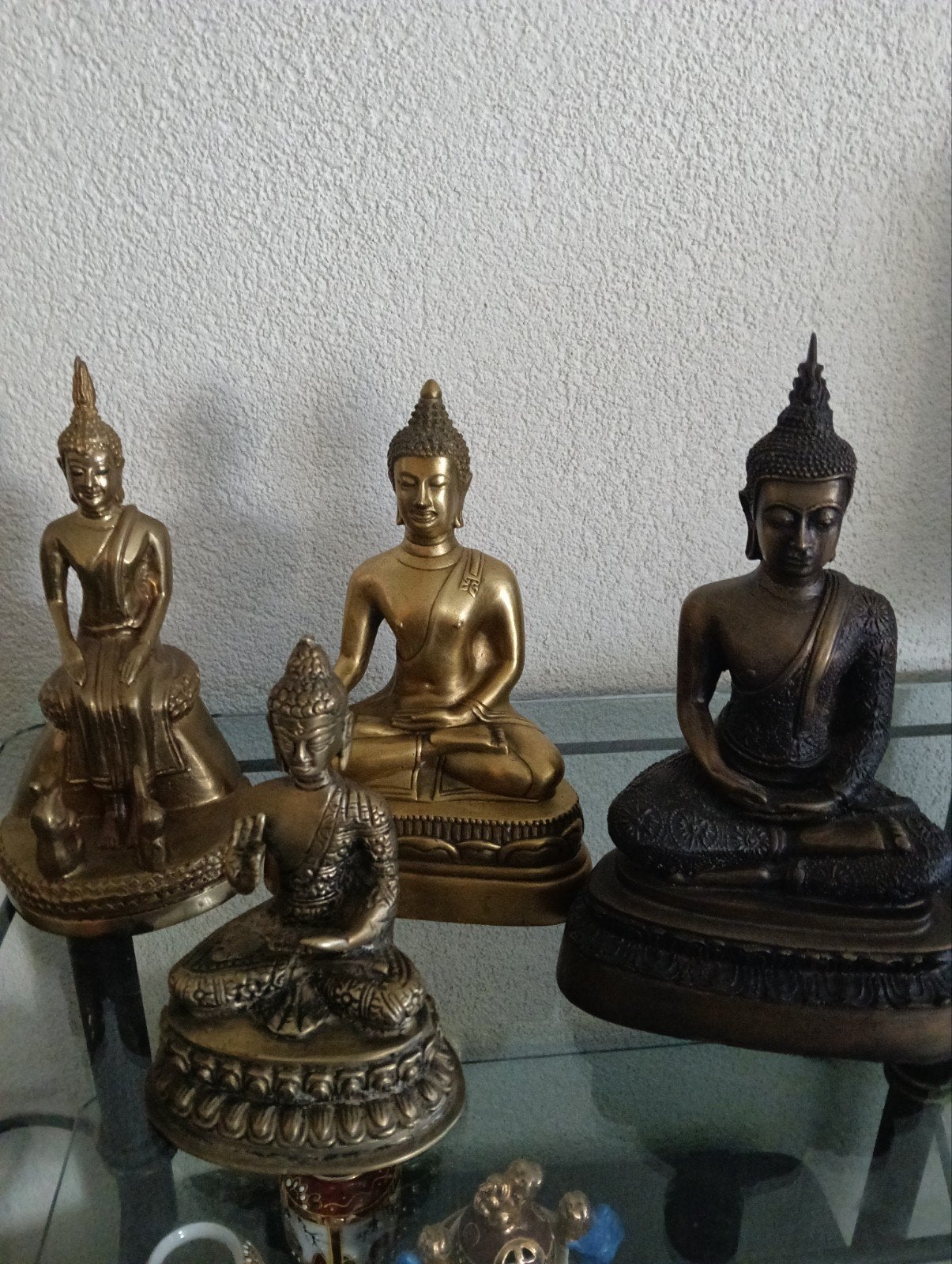 Set van 4 Boeddha beelden - Metaal - Diverse houdingen, Ophalen of Verzenden, Meerkleurig, Set, Metaal
